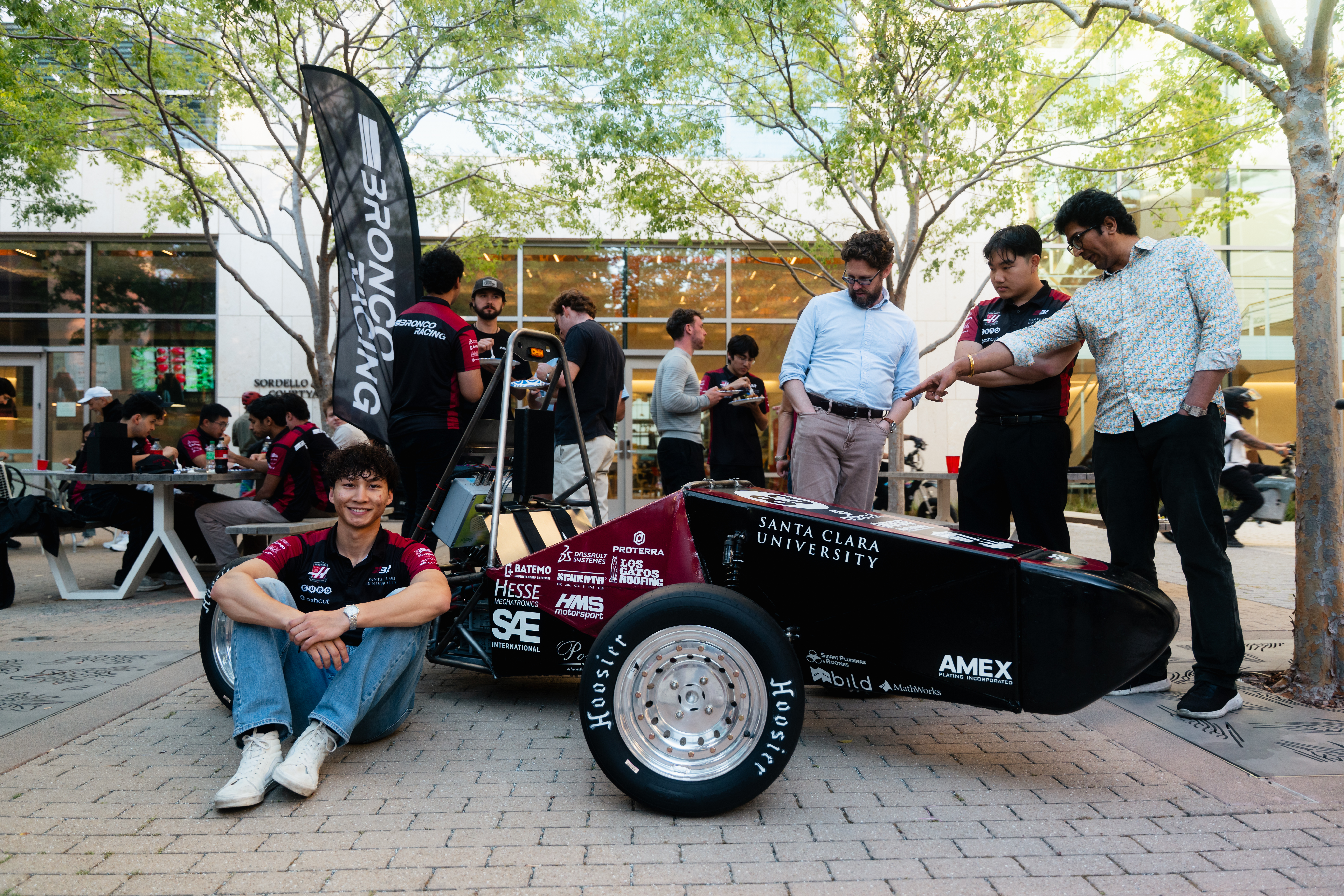 Bronco Racing students working on and presenting their Formula SAE car, photo 3